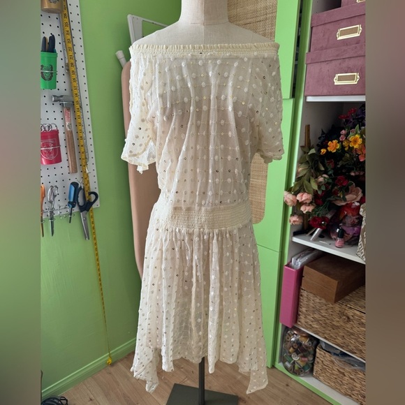 Anthropologie Dresses & Skirts - Cream Off-Shoulder Sharkbite Dress